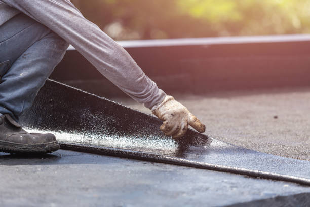 Professional Basement Waterproofing technician working in Plymouth, PA